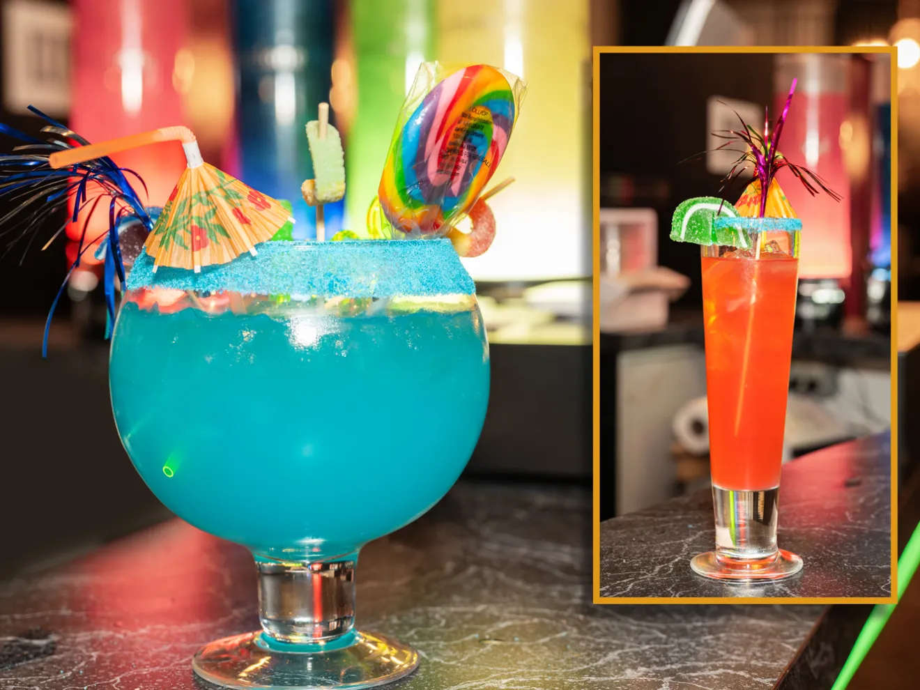 Blue cocktail with umbrella, straw, and lollipop, next to a photo of a red cocktail with lime on a countertop.